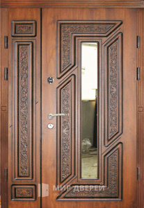 Полуторная коттеджная дверь с резьбой и противосъёмными штырями №107 - фото №1